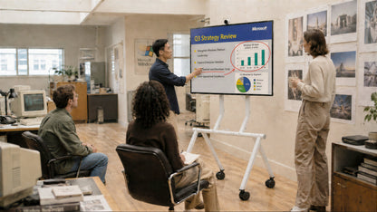 Heckler Rolling Stand for Surface Hub 3 supporting a display in a meeting room.