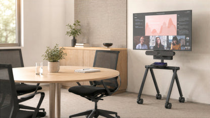 Heckler Express Install Rolling Stand in a meeting room with display and camera.