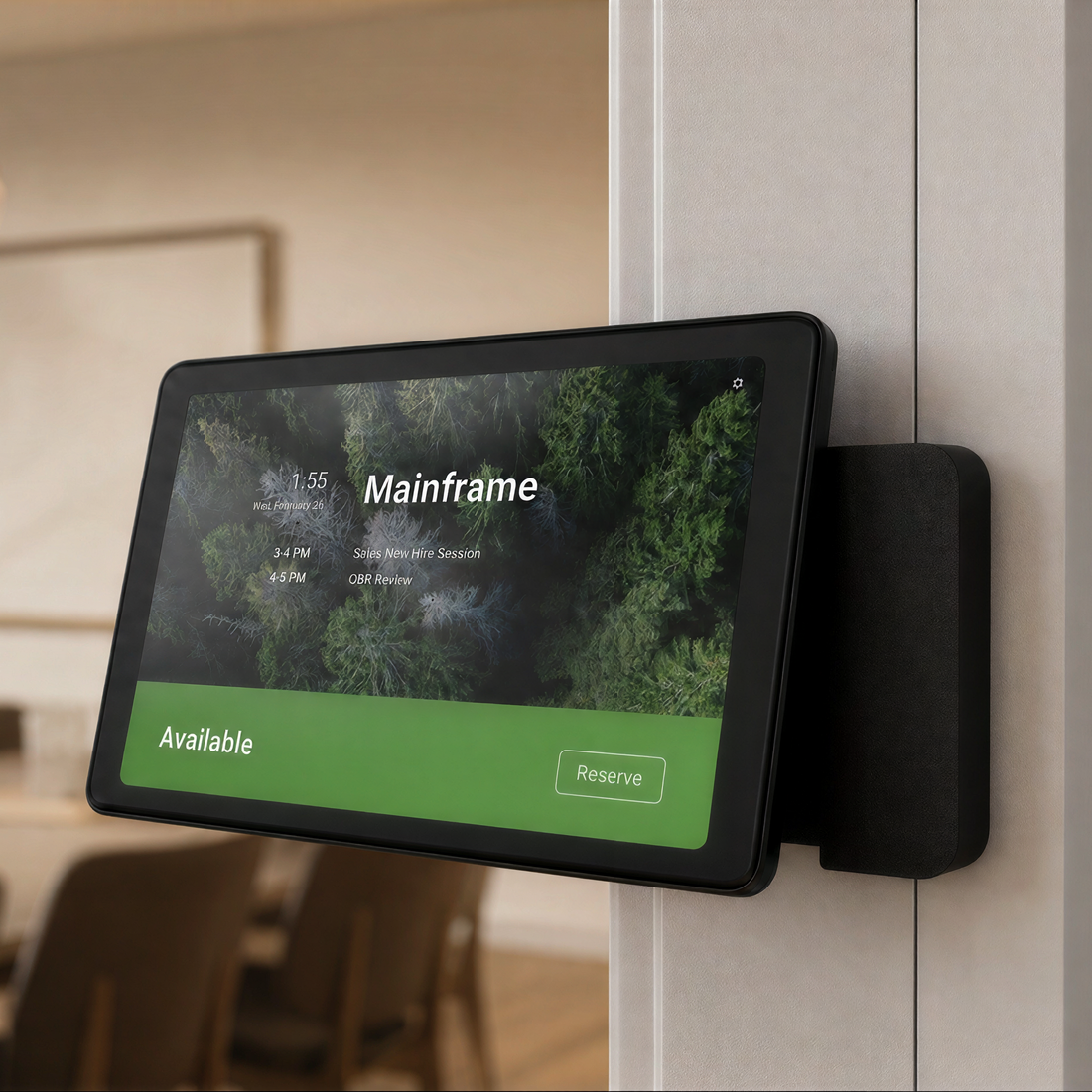 Heckler Front Mount for Neat Pad on a meeting room mullion.